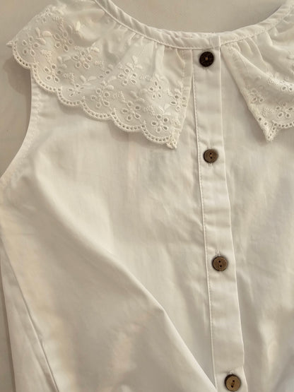 Blusa cuello perforado