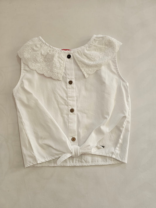 Blusa cuello perforado